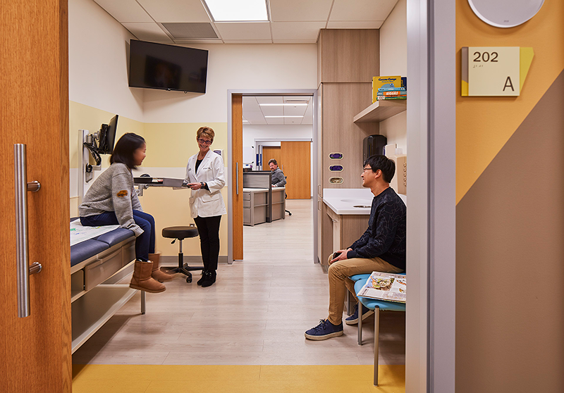 family doctor visit with sliding medical room doors