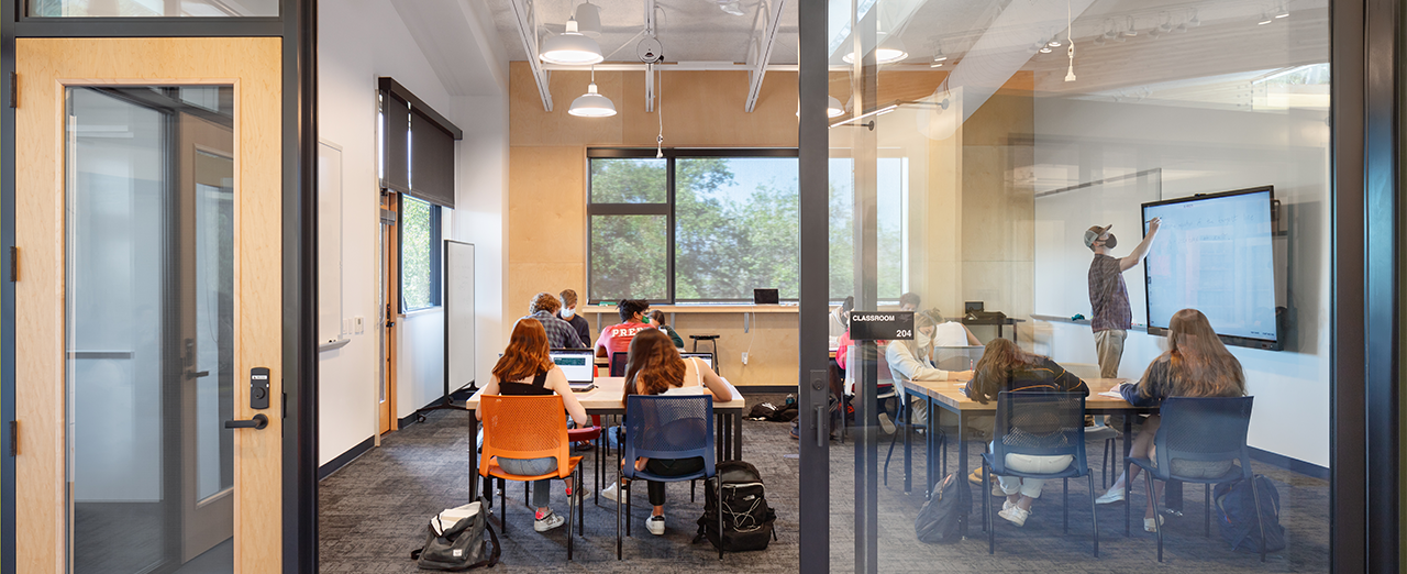 Sliding glass doors opened to create flex spaces for students.