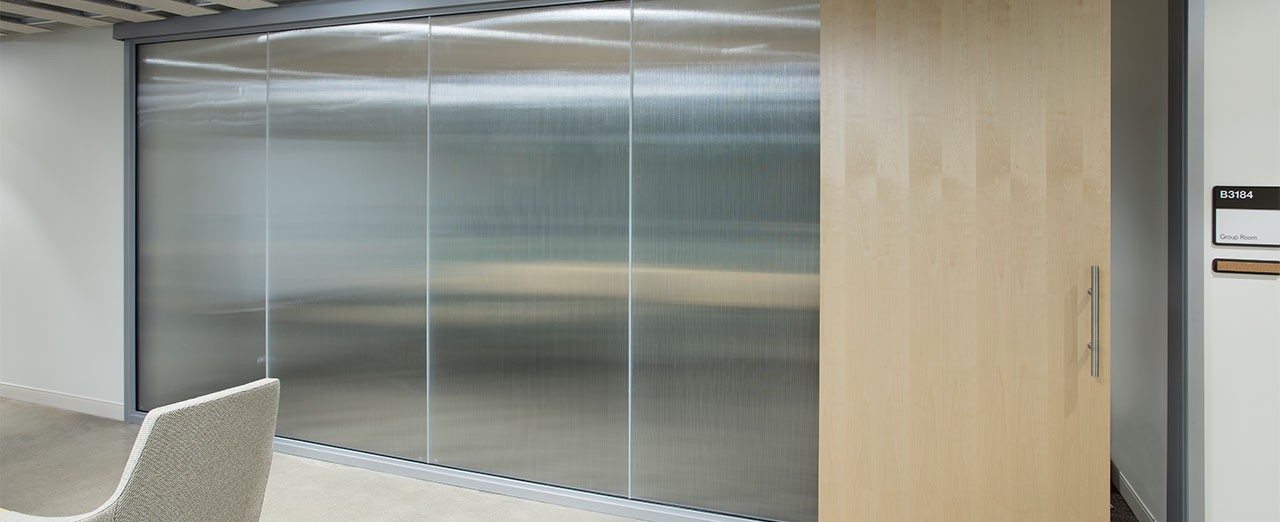 OfficeSlide wooden sliding door installed on group meeting room.