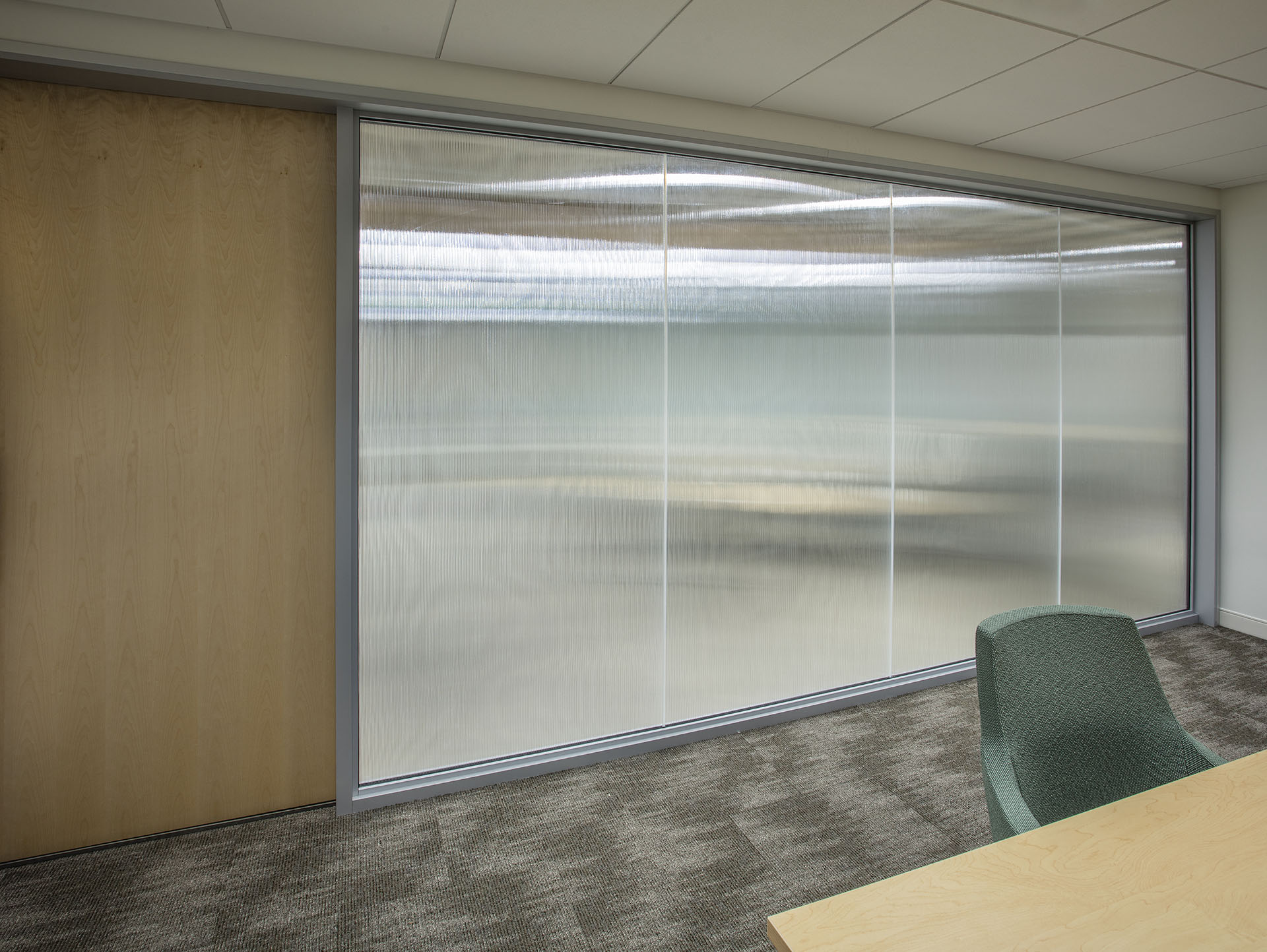 commercial sliding glass door with glass markerboard